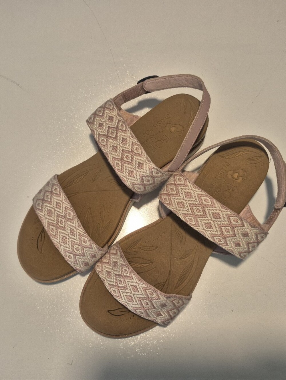 Skechers BOBS Beach Kiss sandals in a blush pink color featuring a woven chevron